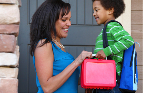 Mom getting child ready for school