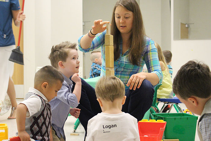 Teacher playing with students